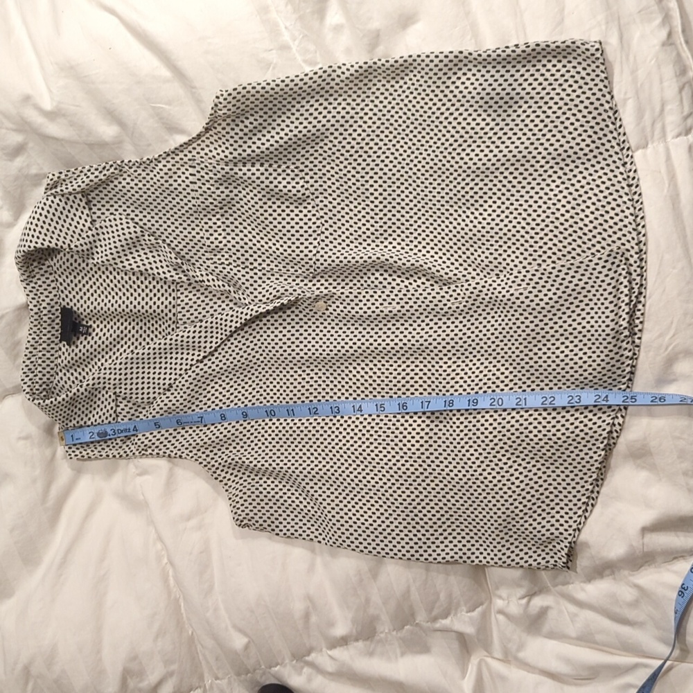 White polka dot sleeveless button down